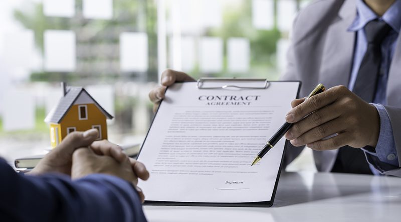 real-estate-agent-home-sales-broker-is-using-a-pen-2023-11-27-05-11-07-utc