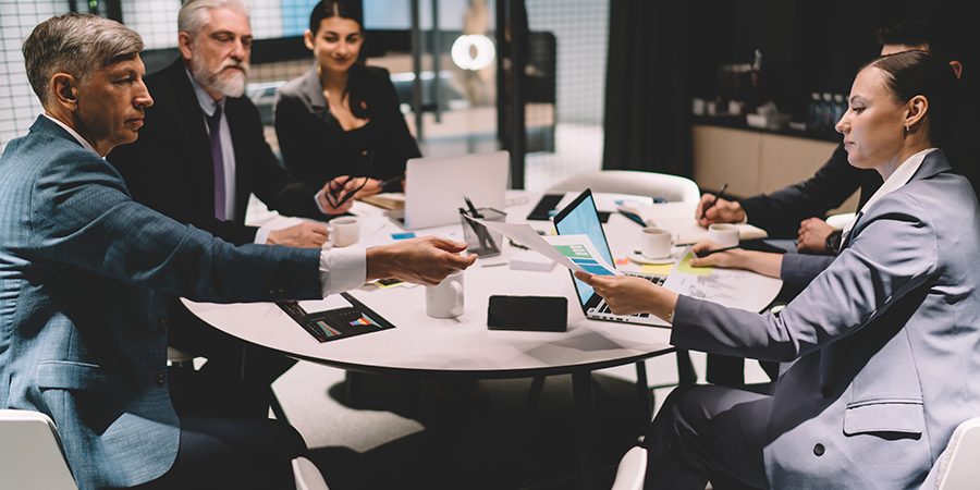 Group of businesspeople having conference in office